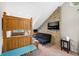 Cozy bedroom with a wooden bunk bed, a stone accent wall, and a comfy black futon at 6300 Grouse Dr, Nineveh, IN 46164