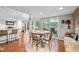 Open dining room with natural light and access to a lake view at 6300 Grouse Dr, Nineveh, IN 46164