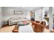 Cozy living room features a comfortable sofa, chairs, and access to the kitchen at 6300 Grouse Dr, Nineveh, IN 46164