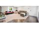 Basement living room featuring two sofas, a recliner, and large windows for natural light at 6300 Grouse Dr, Nineveh, IN 46164