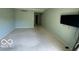 Spacious living room with a TV, neutral walls, and ample natural light at 8577 One W Dr # 301, Indianapolis, IN 46260