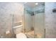 The shower with a frameless door is a stylish touch at 12602 Lockerbie Cir, Carmel, IN 46033
