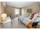 A cozy bedroom with a light and airy feel, perfect for relaxation at 12602 Lockerbie Cir, Carmel, IN 46033