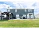 The backyard features a nice patio with gazebo great for relaxing and entertaining at 1266 Hamilton Dr, Greenwood, IN 46143
