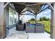 Backyard patio with wicker furniture, grill, and gazebo at 1266 Hamilton Dr, Greenwood, IN 46143