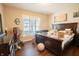 View of the bedroom with wood floors, neutral walls and natural light at 1266 Hamilton Dr, Greenwood, IN 46143