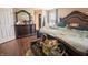 Well-lit bedroom with a large mirror and a bed, plus a large closet for clothing at 1266 Hamilton Dr, Greenwood, IN 46143