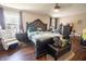 Cozy bedroom with a ceiling fan and comfortable seating, providing a relaxing atmosphere at 1266 Hamilton Dr, Greenwood, IN 46143