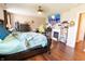 Spacious bedroom with a ceiling fan and fireplace, perfect for cozy evenings at 1266 Hamilton Dr, Greenwood, IN 46143
