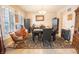 Dining room with tile floors, a decorative rug, and seating for 6 at 1266 Hamilton Dr, Greenwood, IN 46143