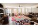 Large living room featuring hardwood floors, a ceiling fan and lots of natural light at 1266 Hamilton Dr, Greenwood, IN 46143