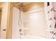 Modern shower featuring a convenient handheld shower head and a built-in soap dish at 1266 Hamilton Dr, Greenwood, IN 46143