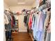 Large walk-in closet with wood flooring, a skylight and ample space for organization at 1266 Hamilton Dr, Greenwood, IN 46143