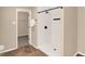 Bathroom with a shower stall and open doorway to a walk-in closet, providing convenience and storage space at 14373 Orange Blossom Trl, Fishers, IN 46038