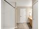 Bathroom featuring a shower, vanity, and doorway; a functional space designed for comfort and convenience at 14373 Orange Blossom Trl, Fishers, IN 46038