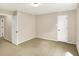 Neutral bedroom with carpet, open closet and white doors, ready for personalization at 14373 Orange Blossom Trl, Fishers, IN 46038