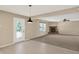 Inviting living room with a cozy fireplace, neutral walls, and plush carpeting for ultimate relaxation and comfort at 14373 Orange Blossom Trl, Fishers, IN 46038