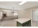Open-concept living room connected to the kitchen, creating a seamless flow for modern living and entertaining at 14373 Orange Blossom Trl, Fishers, IN 46038