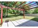 Outdoor patio with a charming pergola and fire pit, ideal for relaxation at 14373 Orange Blossom Trl, Fishers, IN 46038