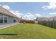 Spacious backyard with a green lawn and wood privacy fence at 2458 Bristol Dr, Franklin, IN 46131