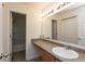 Bright bathroom features large mirror, vanity with solid surface top, and tub/shower combo at 2458 Bristol Dr, Franklin, IN 46131