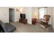 Living room showcasing a rocking chair, window with curtains, and television at 2458 Bristol Dr, Franklin, IN 46131