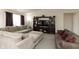 Inviting living area with a large sectional sofa and entertainment center, creating a cozy and functional space at 2458 Bristol Dr, Franklin, IN 46131