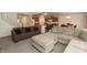 Cozy living area with comfortable couches, seamlessly blending into the kitchen and dining spaces for modern living at 2458 Bristol Dr, Franklin, IN 46131