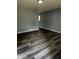 Spacious living area with attractive flooring, neutral paint, and natural lighting at 2907 Baltimore Ave, Indianapolis, IN 46218