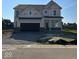 Charming two-story home with a front-entry two-car garage and covered entry at 3110 Montgomery Blvd, Lapel, IN 46051