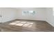 Spacious bedroom with large windows and neutral-colored flooring at 3120 S Meridian Rd, Greenfield, IN 46140