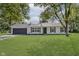 Charming single-story home with a well-manicured lawn at 3120 S Meridian Rd, Greenfield, IN 46140