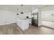 Bright eat-in kitchen features an island and stainless steel appliances at 3120 S Meridian Rd, Greenfield, IN 46140