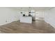 Open living area with an island and stainless appliances at 3120 S Meridian Rd, Greenfield, IN 46140