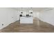 Open living area with an island and stainless appliances at 3120 S Meridian Rd, Greenfield, IN 46140