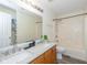 Bathroom with double sinks, marble countertops, and combined shower and tub at 3624 Newberry Rd, Plainfield, IN 46168
