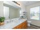 Bathroom featuring double sinks with marble countertops, and natural light at 3624 Newberry Rd, Plainfield, IN 46168