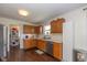 Well-appointed kitchen with wooden cabinets, stainless steel appliances, and an adjacent pantry at 3624 Newberry Rd, Plainfield, IN 46168
