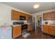 Charming kitchen features wood cabinets and modern stainless steel appliances at 3624 Newberry Rd, Plainfield, IN 46168