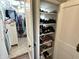 Well-organized closet with shelves and hanging space, ideal for maximizing storage and keeping items tidy at 4106 N Sherman Dr, Indianapolis, IN 46226