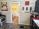 View of the kitchen featuring stainless steel appliances and doorway view to an adjoining dining area at 4106 N Sherman Dr, Indianapolis, IN 46226