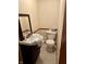 Small half bathroom featuring vanity with sink and toilet providing efficient functionality and a classic design at 474 N Kristi Rd, Martinsville, IN 46151