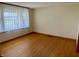 Bright bedroom featuring hardwood floors and a window that provide natural light at 474 N Kristi Rd, Martinsville, IN 46151