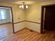 Cozy dining area with modern lighting, wood trim, and easy access to other rooms at 474 N Kristi Rd, Martinsville, IN 46151