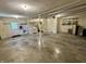 Spacious garage featuring painted walls, a window, an outdoor exit and open area with laundry appliances at 474 N Kristi Rd, Martinsville, IN 46151