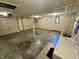 Spacious garage featuring painted walls, a window and an open area offering potential for various uses at 474 N Kristi Rd, Martinsville, IN 46151