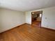 Living room with hardwood floors that opens to the kitchen at 474 N Kristi Rd, Martinsville, IN 46151