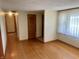 Spacious living room with hardwood floors and natural light from the window at 474 N Kristi Rd, Martinsville, IN 46151