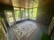 View of the landscaped backyard from a bright and airy screened in patio at 474 N Kristi Rd, Martinsville, IN 46151