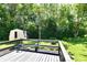 Relaxing backyard deck perfect for outdoor seating and enjoying the serene garden view at 524 Concord Ct, Fishers, IN 46038
